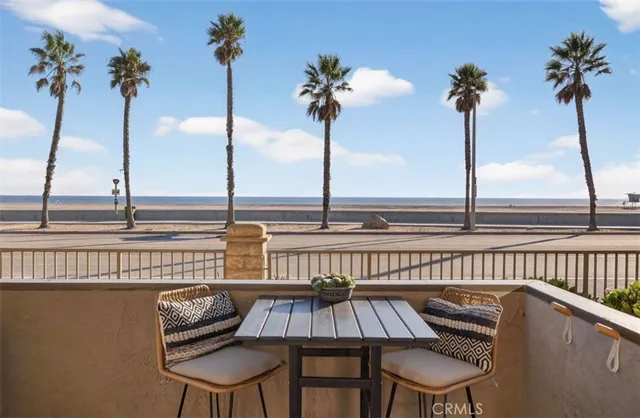 a view of a balcony with furniture