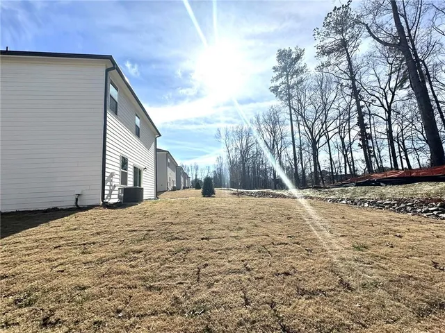 a house with trees in front of it