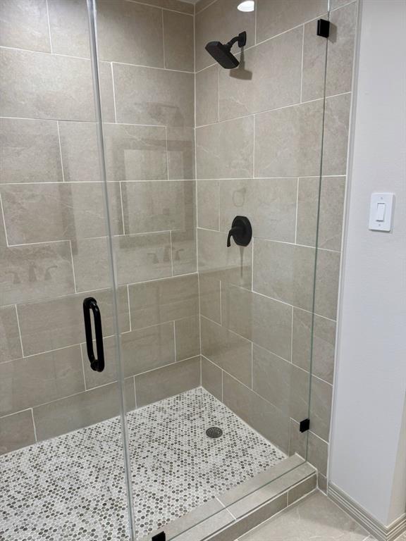 3601 Scott Drive Rowlett, TX 75088 - Photo 12 of 19 a bathroom with a shower