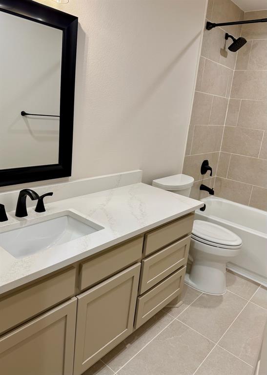 3601 Scott Drive Rowlett, TX 75088 - Photo 15 of 19 a bathroom with a sink and a mirror