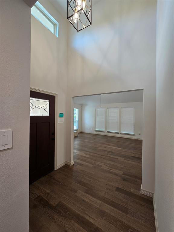 3601 Scott Drive Rowlett, TX 75088 - Photo 3 of 19 a view of a hallway with wooden floor and closet
