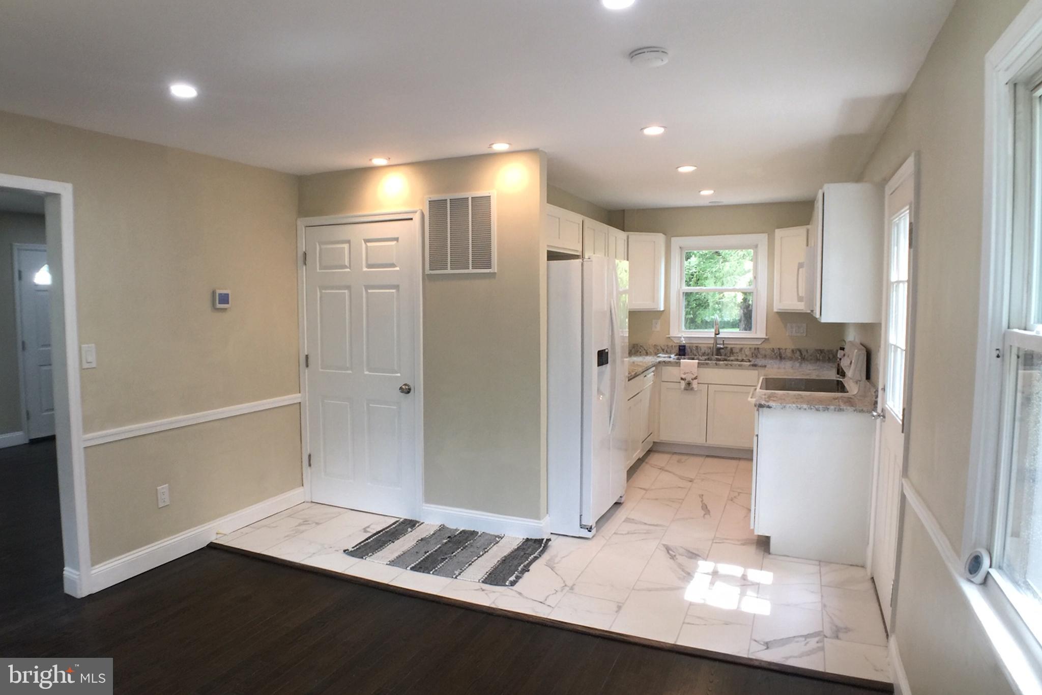 853 Reece Road Severn, MD 21144 - Photo 11 of 54 View into kitchen from dining room