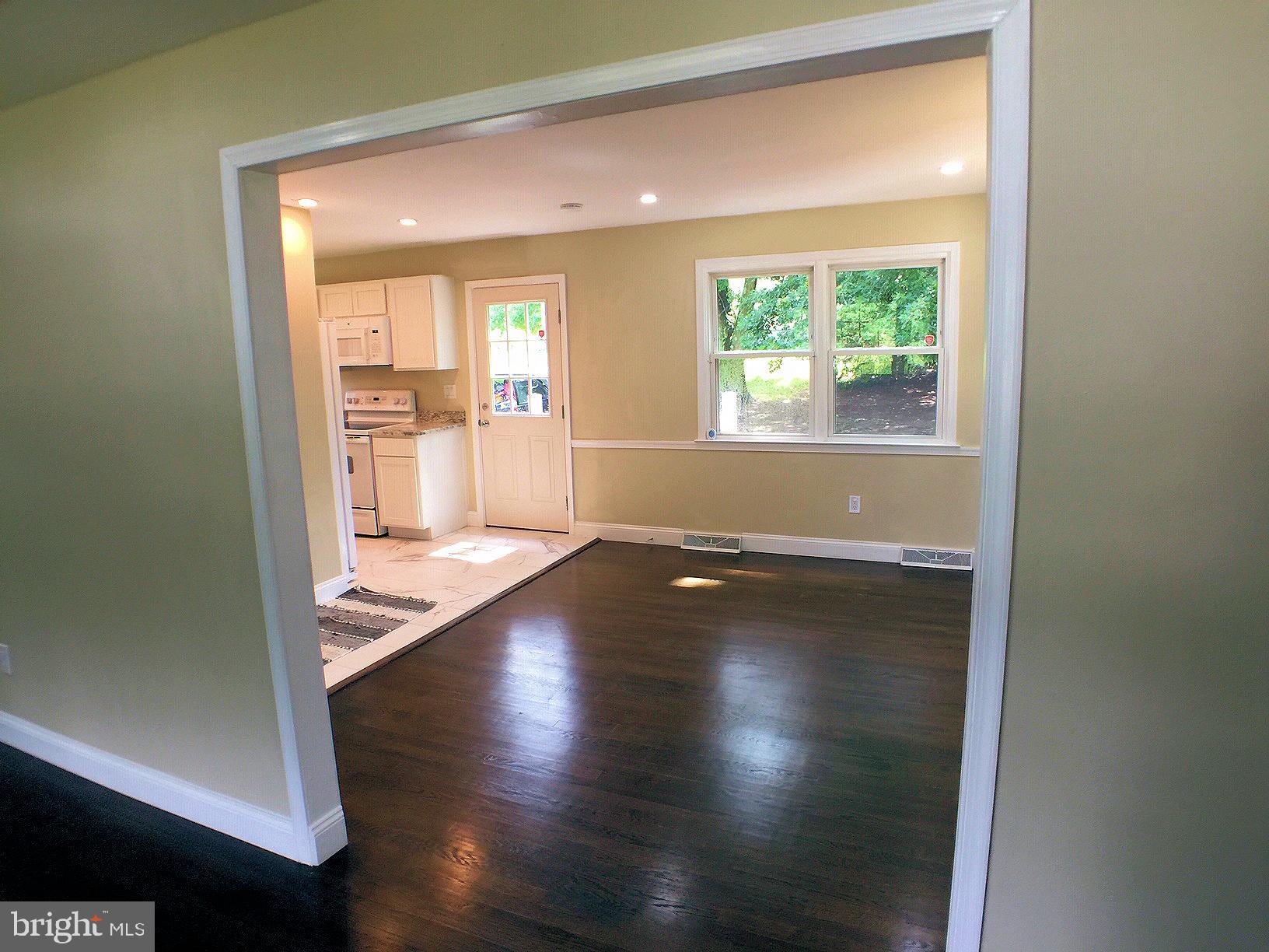 853 Reece Road Severn, MD 21144 - Photo 15 of 54 View into dining room from living room