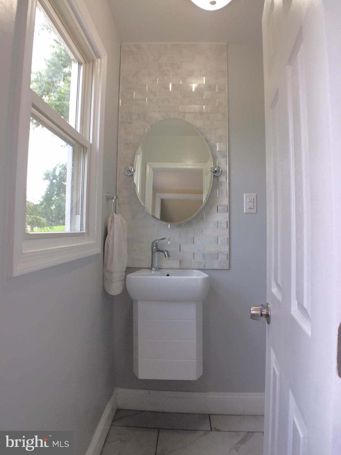 853 Reece Road Severn, MD 21144 - Photo 23 of 54 Main-floor powder room