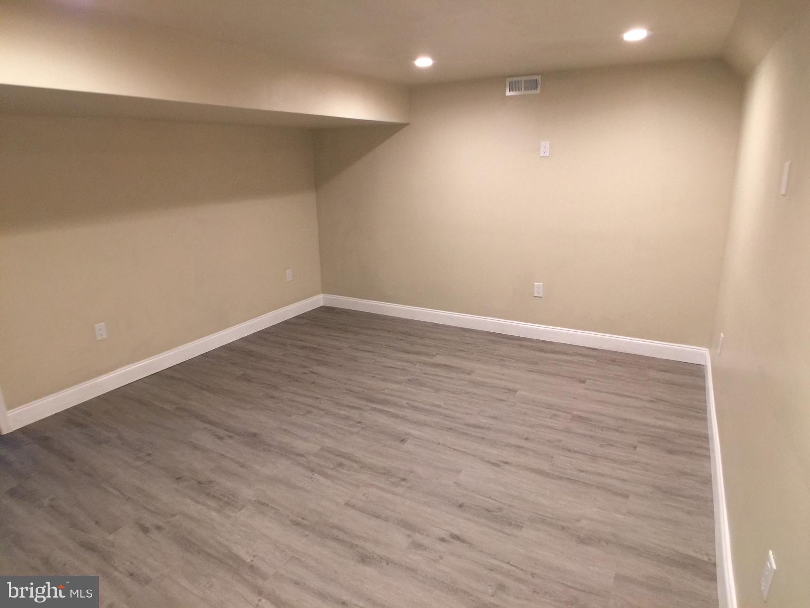 853 Reece Road Severn, MD 21144 - Photo 39 of 54 Lower-level media room
