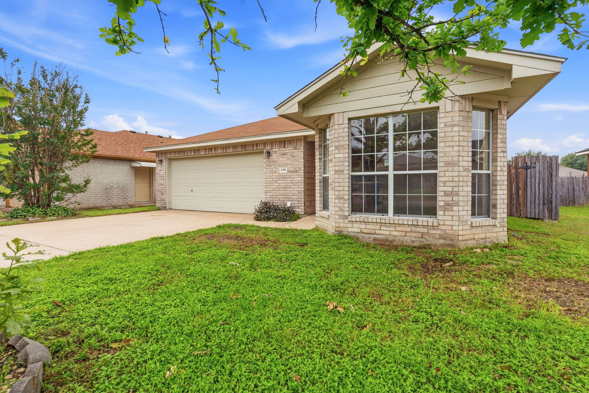116 Blue Ridge Trail Elgin, TX 78621 - Photo 2 of 28 a house with garden