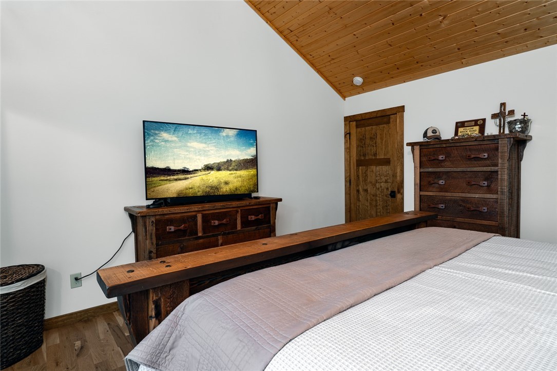 1161 Grandview Dr Extension Boone, NC 28607 - Photo 16 of 43 a bedroom with a bed and flat screen tv