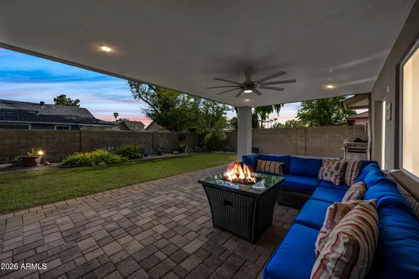 a outdoor living space with furniture and a garden