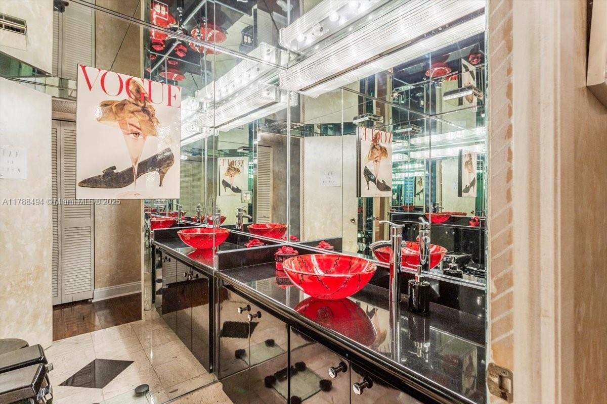 2808 North 46th Avenue, Unit E650 Hollywood, FL 33021 - Photo 22 of 45 a view of a chairs and table in a balcony