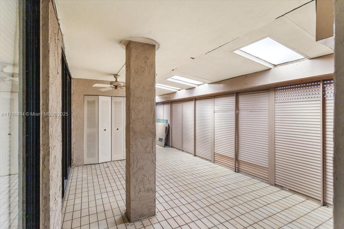 2808 North 46th Avenue, Unit E650 Hollywood, FL 33021 - Photo 41 of 45 a view of a bathroom with a shower