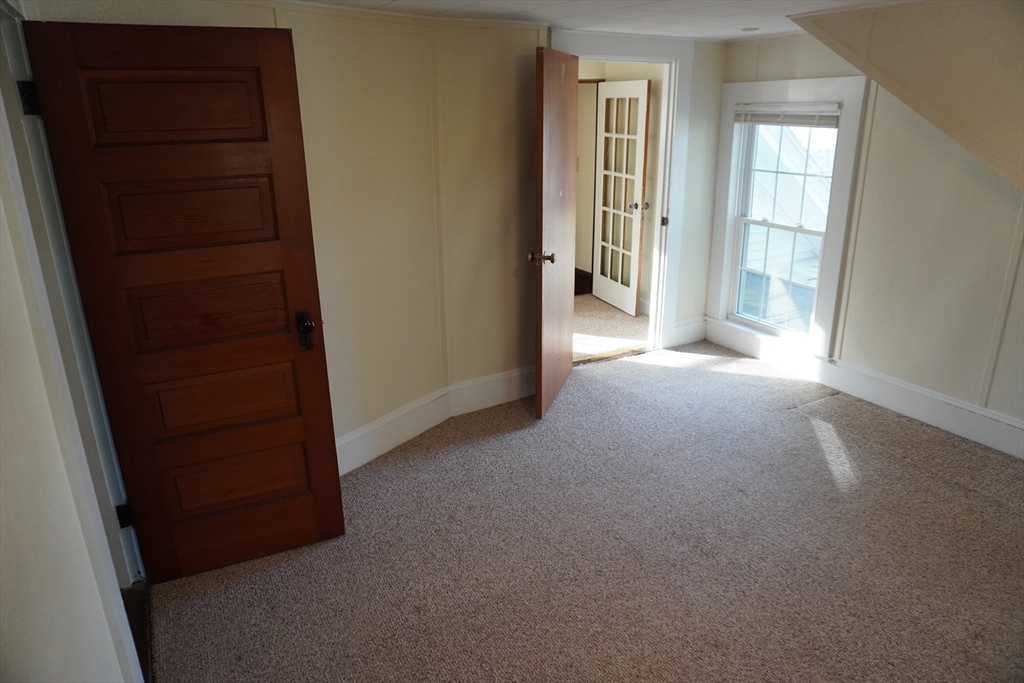 28 Court Street Mansfield, MA 02048 - Photo 16 of 39 an empty room with windows