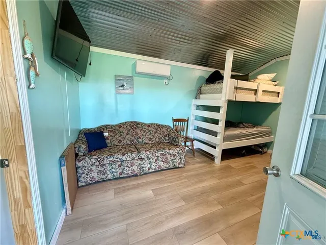 a view of a balcony with chairs