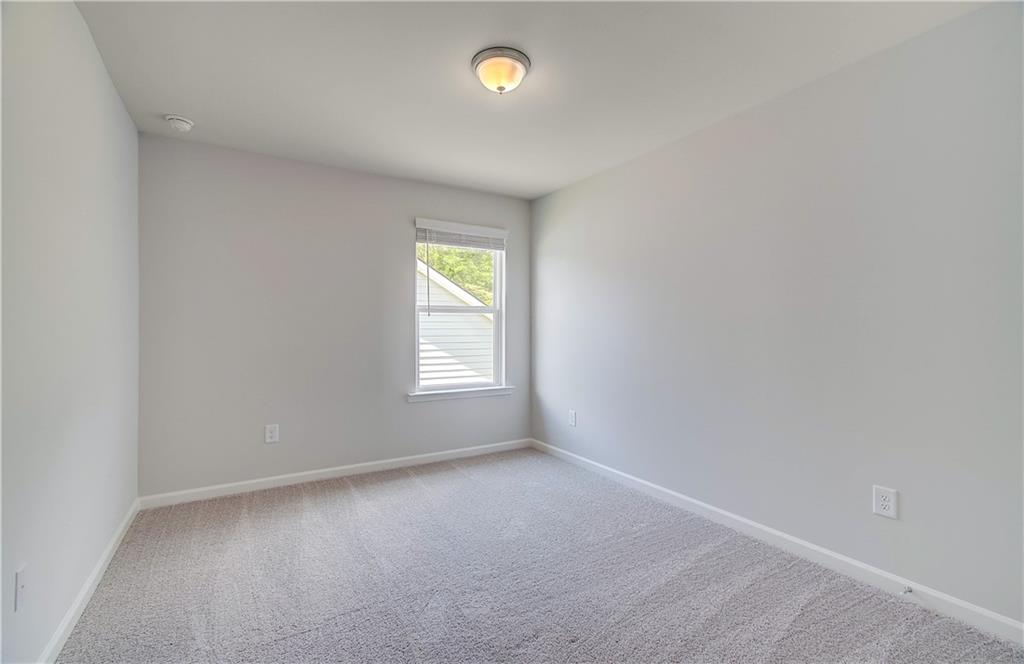 117 Alpine Road Fairburn, GA 30213 - Photo 19 of 29 an empty room with a window