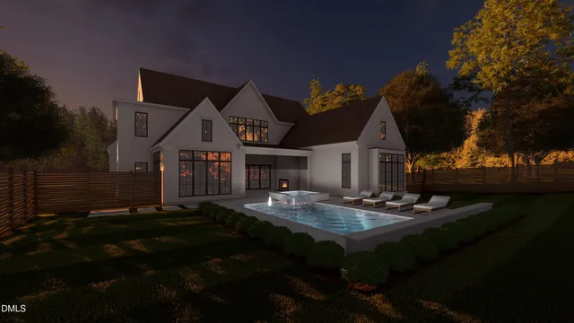 a backyard of a house with table and chairs