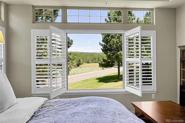 a view of front door and bedroom
