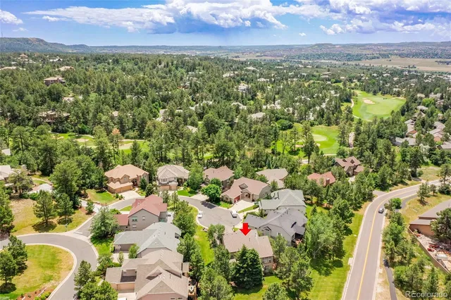 a view of a city with lots of trees