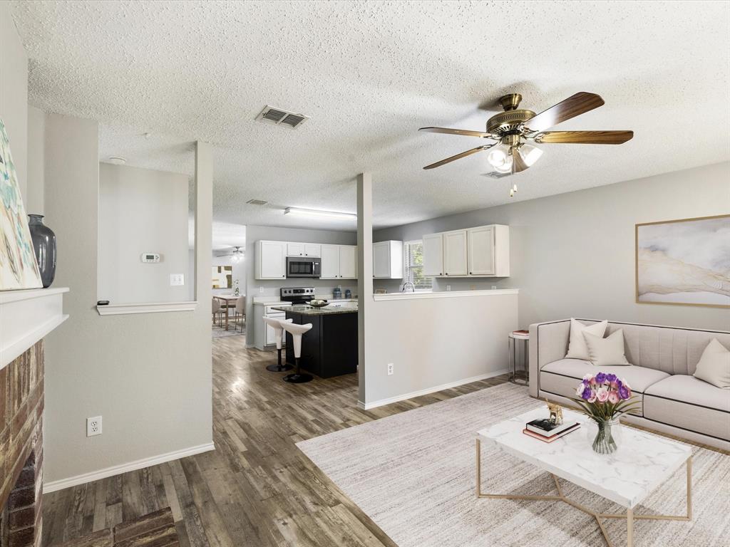 8212 Canoe Ridge Lane Denton, TX 76210 - Photo 12 of 40 Virtually staged family room