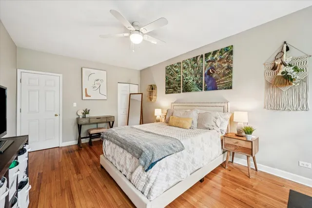 a bedroom with a bed and a table in it