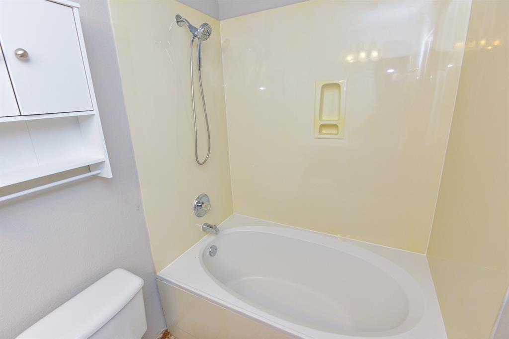 2109 Kimra Lane Cedar Park, TX 78613 - Photo 18 of 31 Full bathroom featuring bathtub / shower combination and toilet