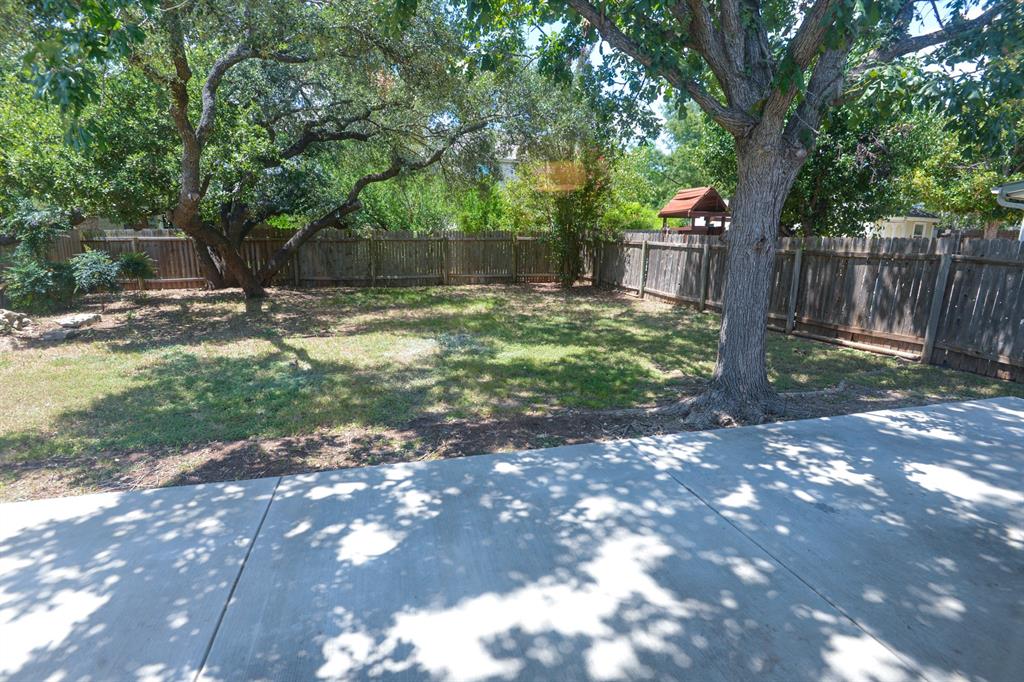 2109 Kimra Lane Cedar Park, TX 78613 - Photo 28 of 31 View of fenced backyard