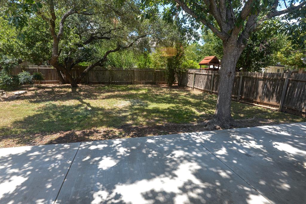 2109 Kimra Lane Cedar Park, TX 78613 - Photo 31 of 31 View of fenced backyard