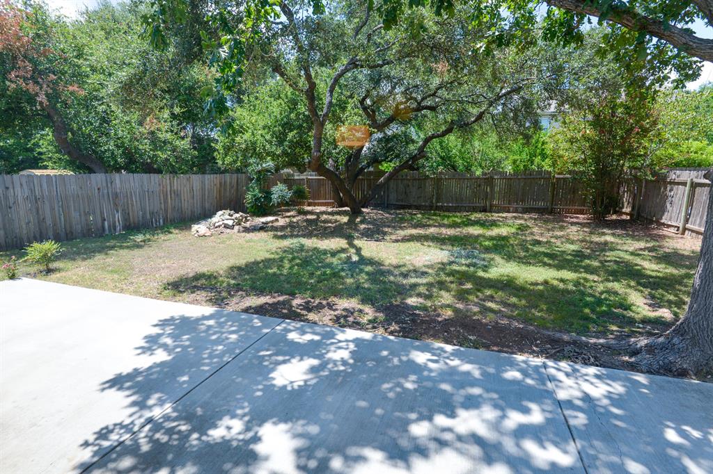 2109 Kimra Lane Cedar Park, TX 78613 - Photo 5 of 31 View of fenced backyard