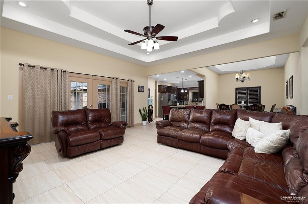 1609 Trinity Street Mission, TX 78572 - Photo 4 of 15 a living room with furniture and a ceiling fan