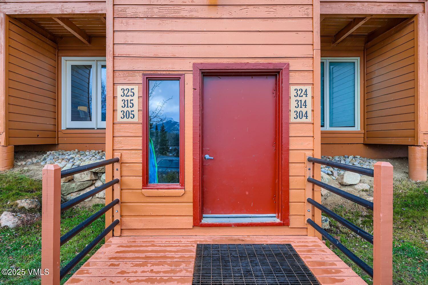 91300 Ryan Gulch Road, Unit 305 Silverthorne, CO 80498 - Photo 16 of 46 a view of a entryway door front of house