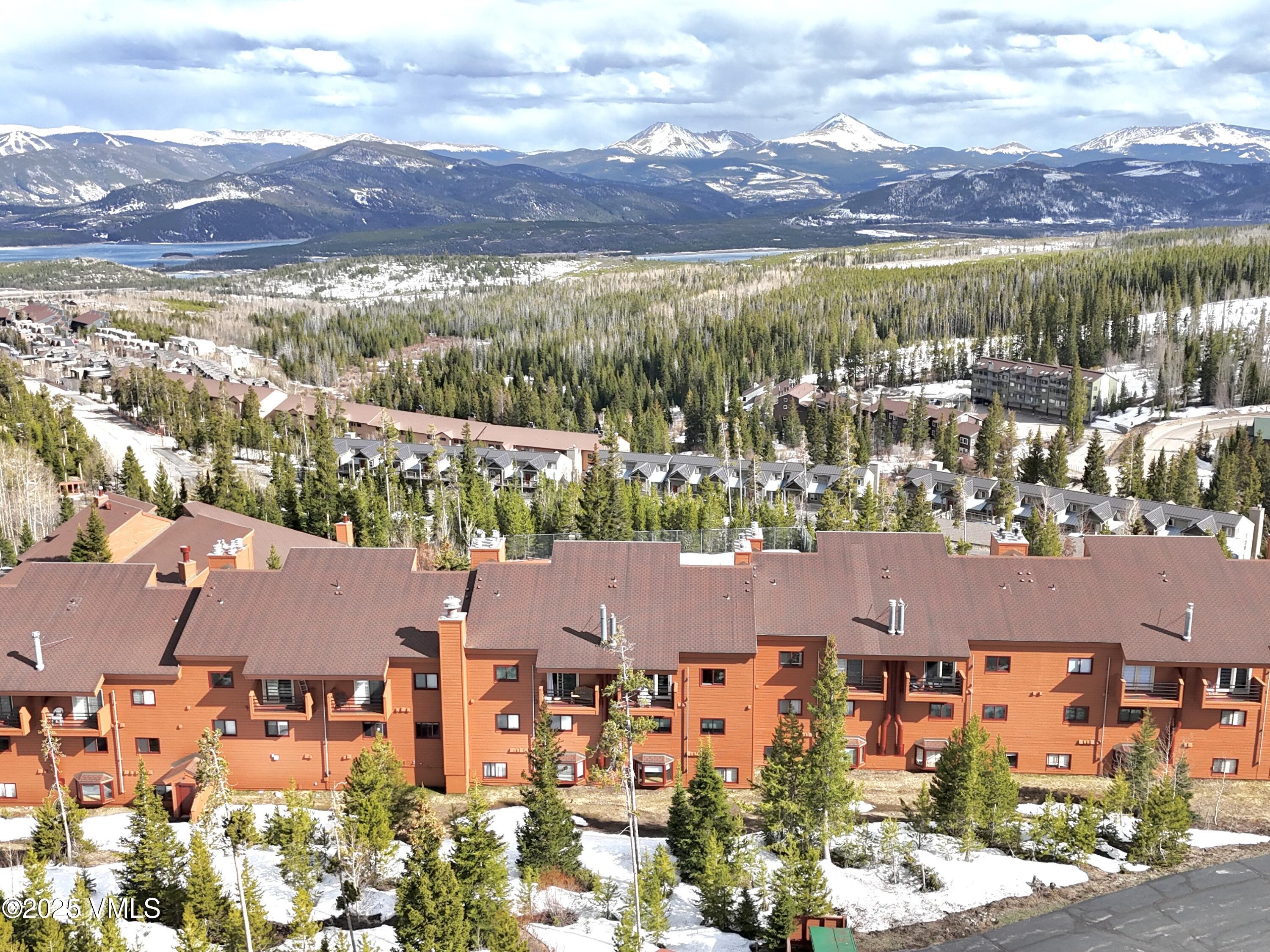 91300 Ryan Gulch Road, Unit 305 Silverthorne, CO 80498 - Photo 34 of 46 an aerial view of residential houses and outdoor space