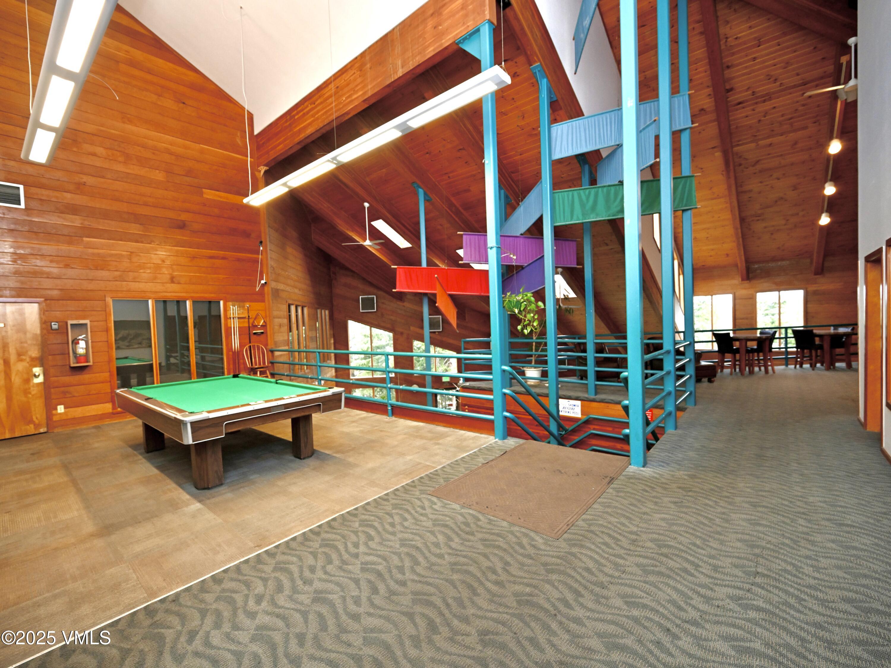 91300 Ryan Gulch Road, Unit 305 Silverthorne, CO 80498 - Photo 37 of 46 a view of outdoor space with seating area and swimming pool