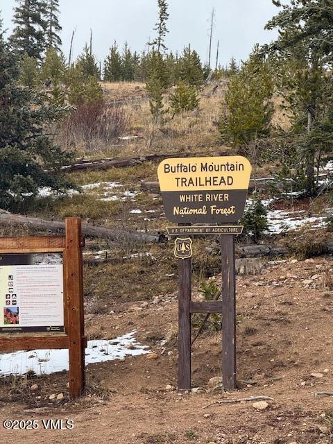 91300 Ryan Gulch Road, Unit 305 Silverthorne, CO 80498 - Photo 41 of 46 a sign board on the side of a road