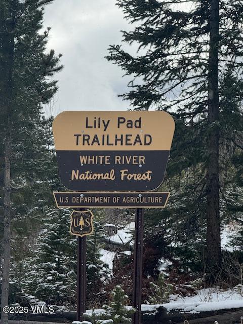 91300 Ryan Gulch Road, Unit 305 Silverthorne, CO 80498 - Photo 43 of 46 a sign broad on the side of the road