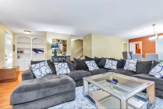 a living room with furniture and a couch