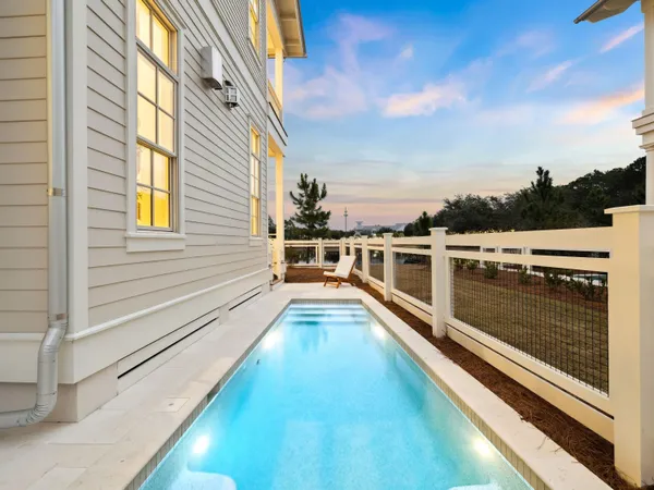a view of a balcony with a ocean view
