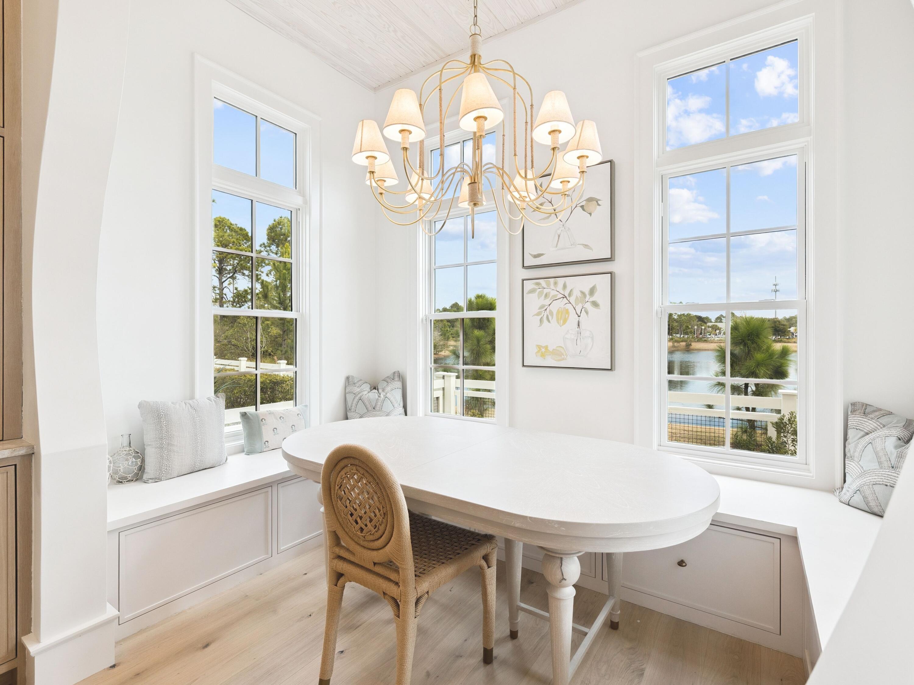 34 Climbing Rose Way Santa Rosa Beach, FL 32459 - Photo 14 of 34 a dining room with furniture a chandelier and wooden floor