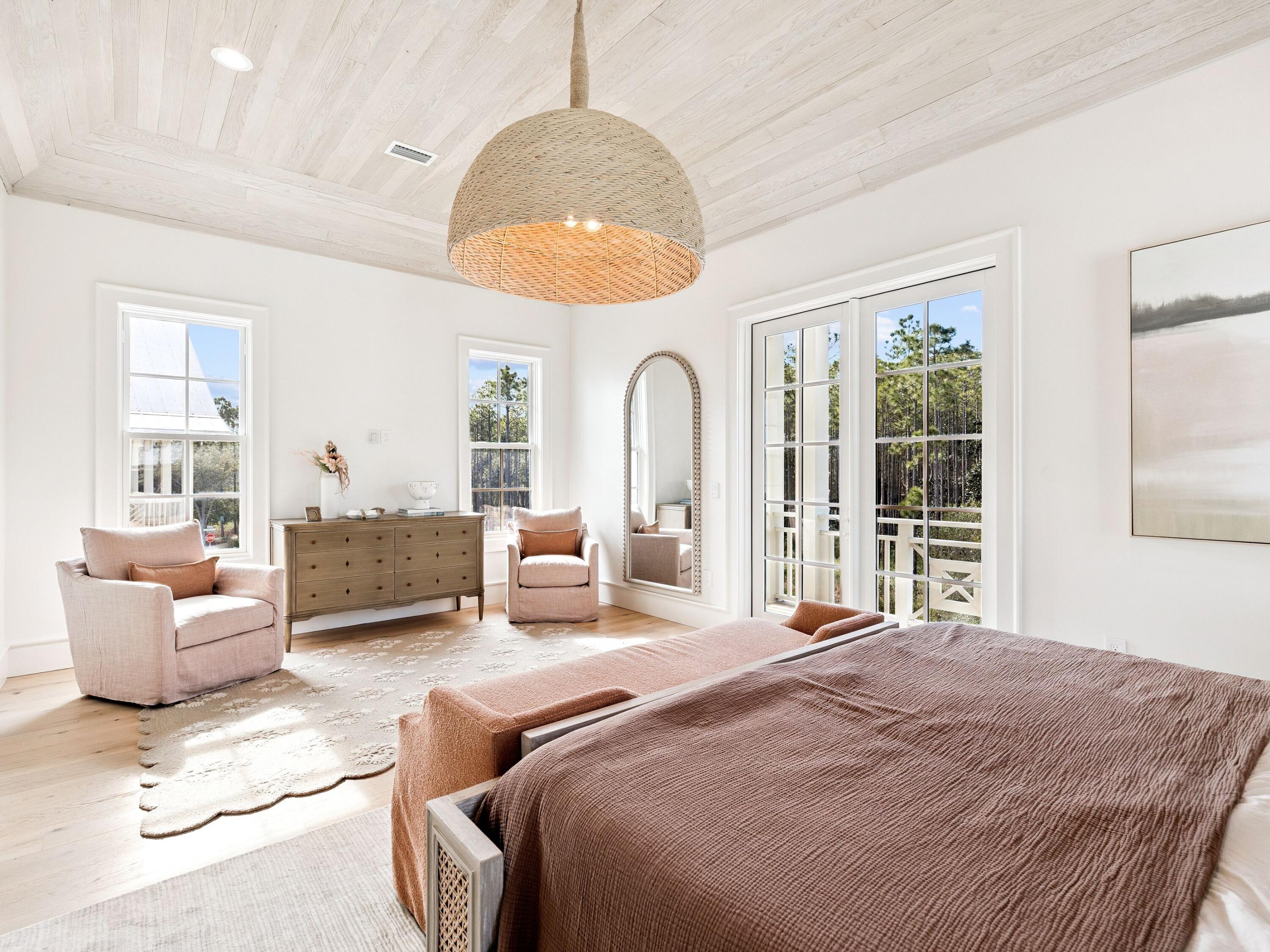 34 Climbing Rose Way Santa Rosa Beach, FL 32459 - Photo 19 of 34 a spacious bedroom with a bed couch and window