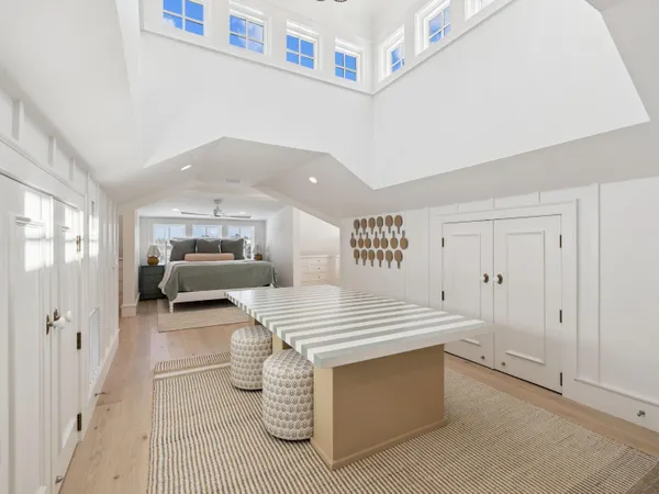 a view of living room filled with furniture and window