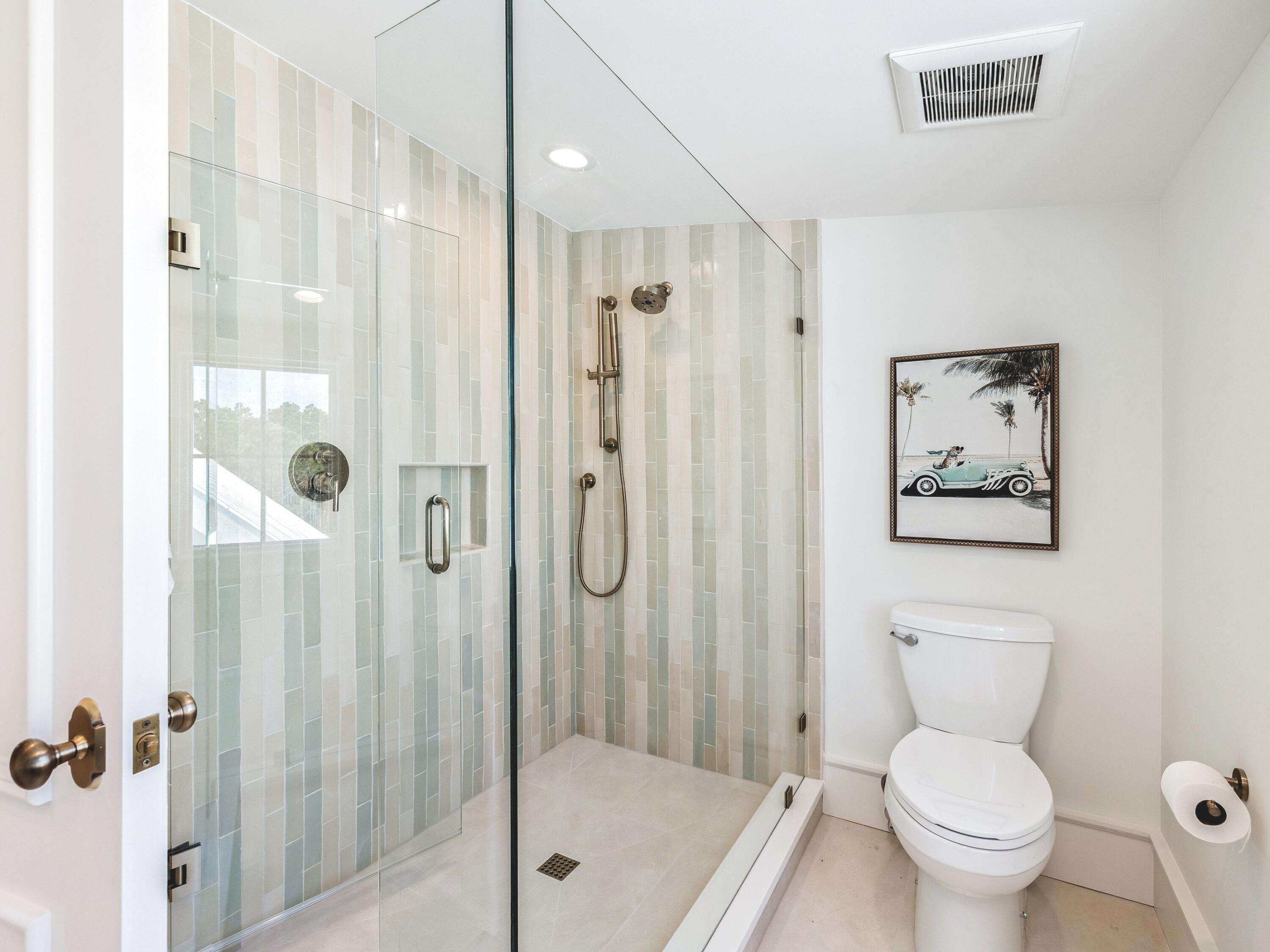 34 Climbing Rose Way Santa Rosa Beach, FL 32459 - Photo 28 of 34 a bathroom with a toilet sink and shower