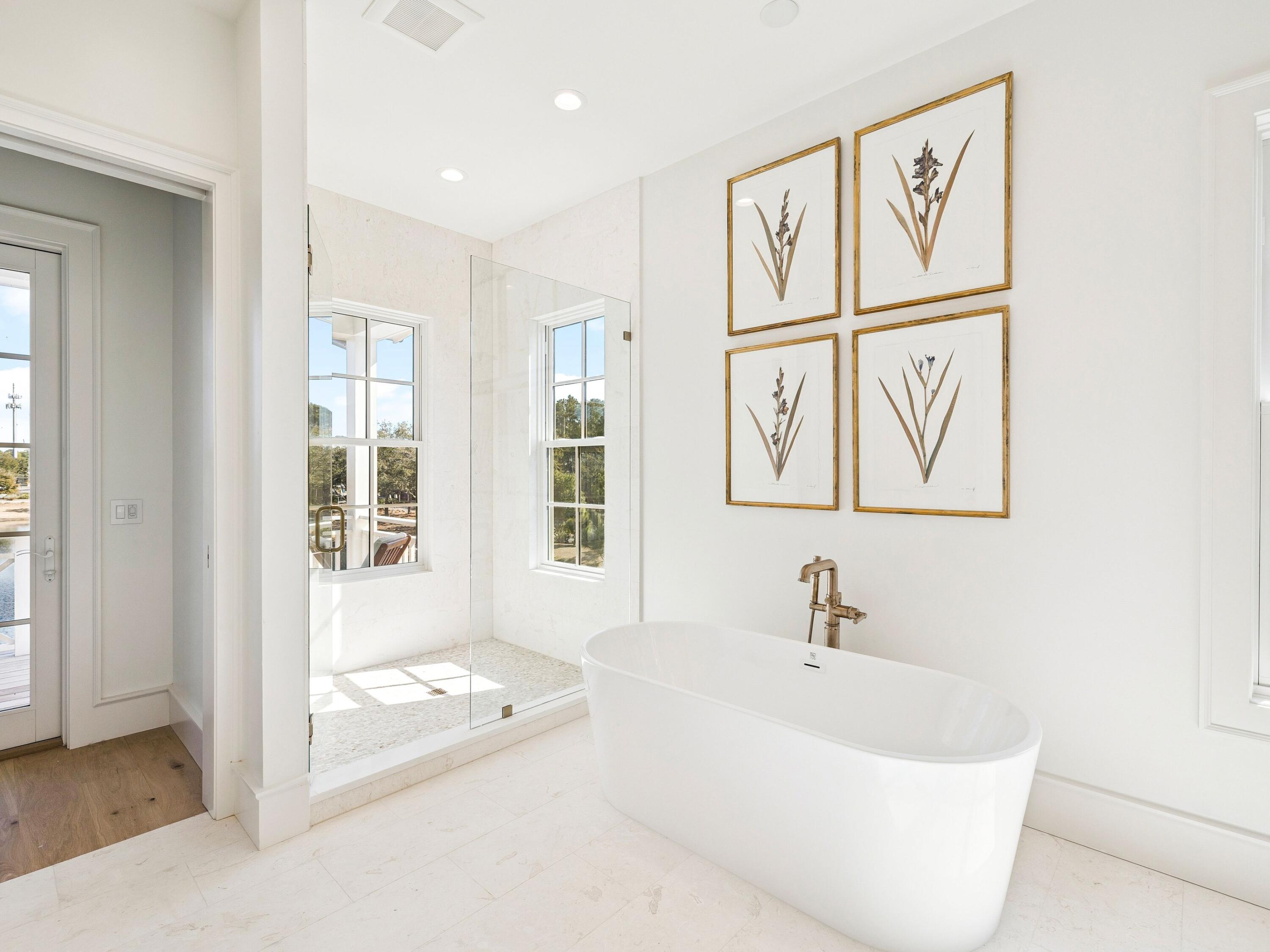 34 Climbing Rose Way Santa Rosa Beach, FL 32459 - Photo 8 of 34 a white bath tub sitting next to a window