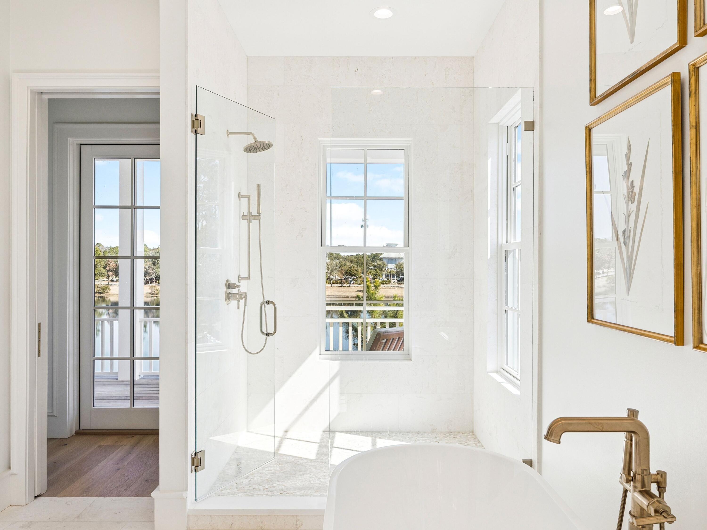 34 Climbing Rose Way Santa Rosa Beach, FL 32459 - Photo 9 of 34 a bathroom with a tub shower and windows