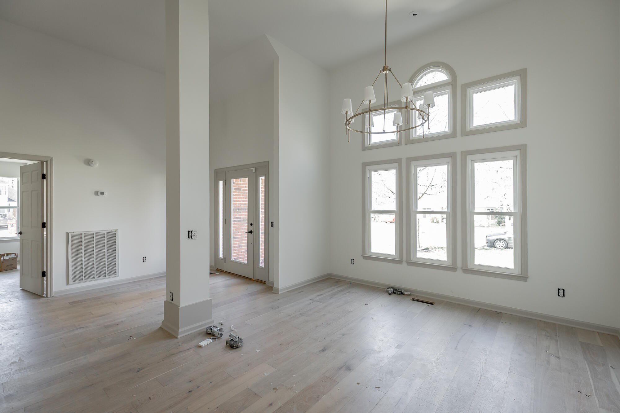 1618 Gunston Hall Road Hixson, TN 37343 - Photo 12 of 25 an empty room with wooden floor and windows