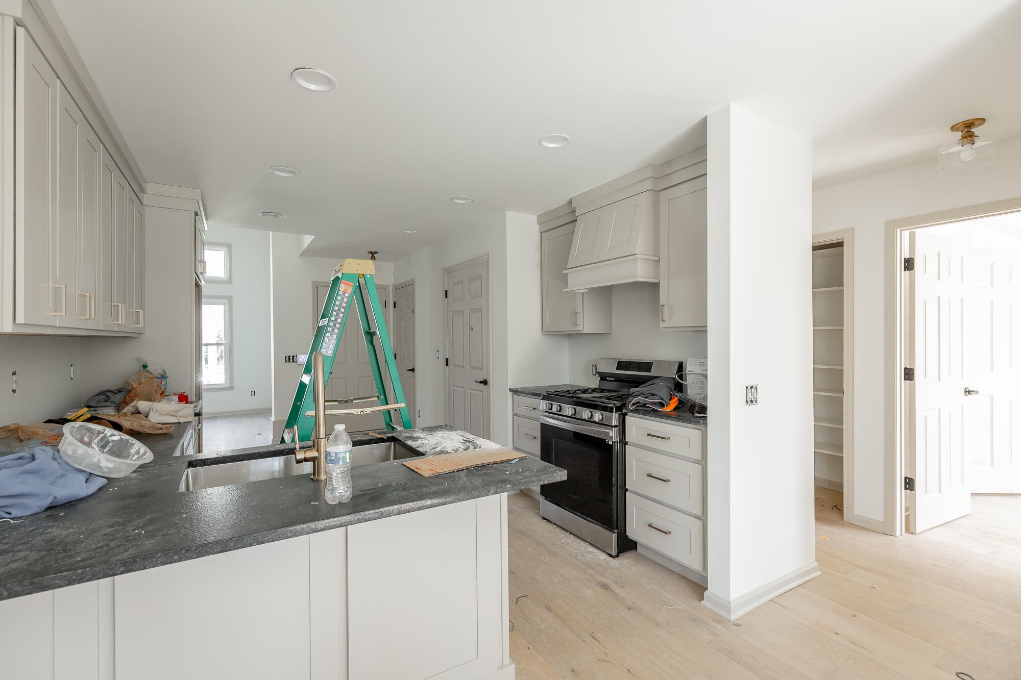 1618 Gunston Hall Road Hixson, TN 37343 - Photo 14 of 25 a kitchen with a sink stove and cabinets