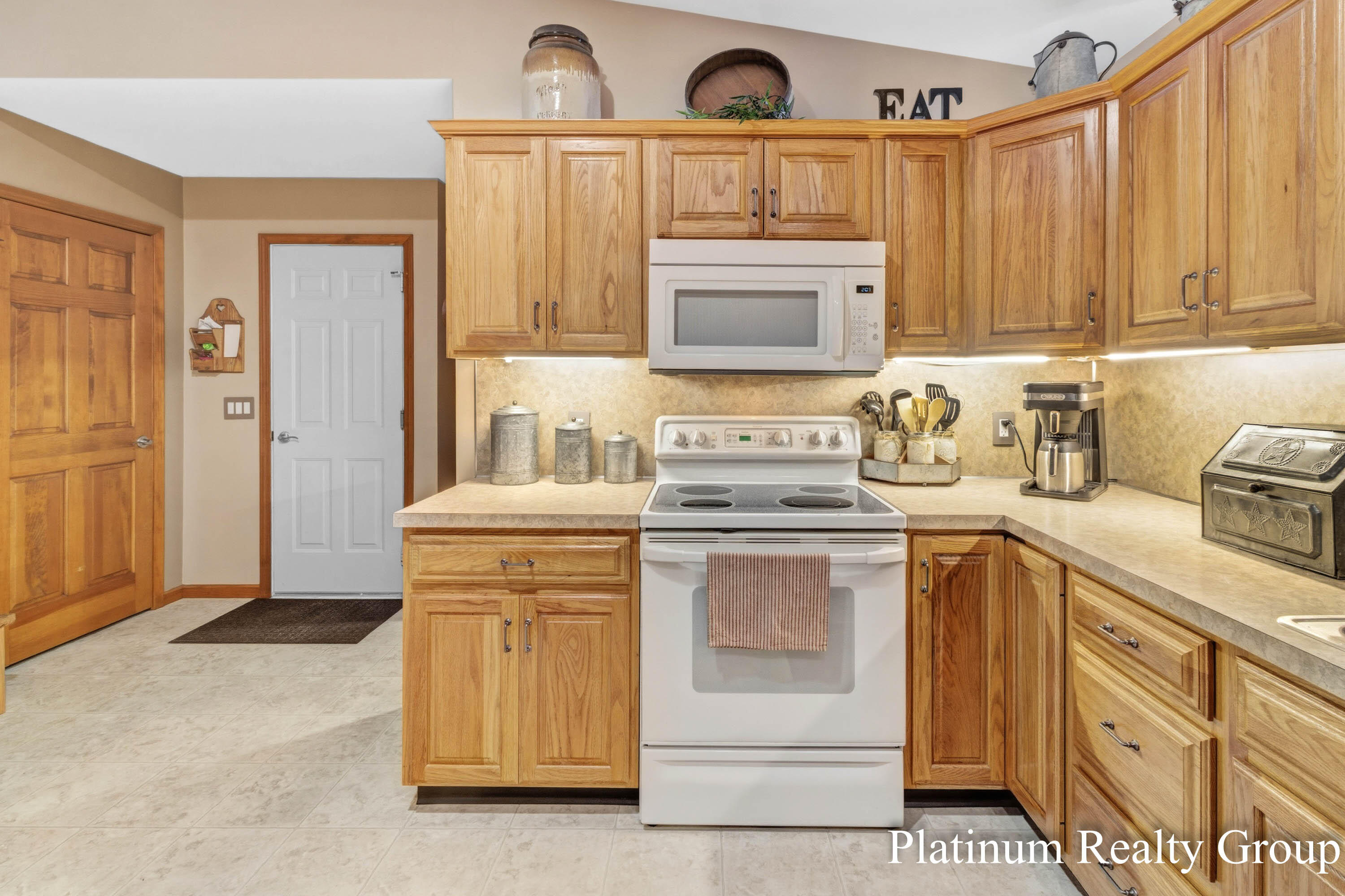 6226 Hall Road Muskegon, MI 49442 - Photo 21 of 53 Kitchen to Garage Entry and Laundry Room