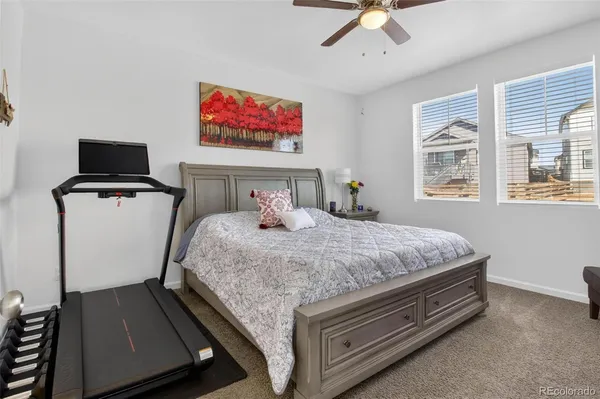 a bed room with a bed and a tv