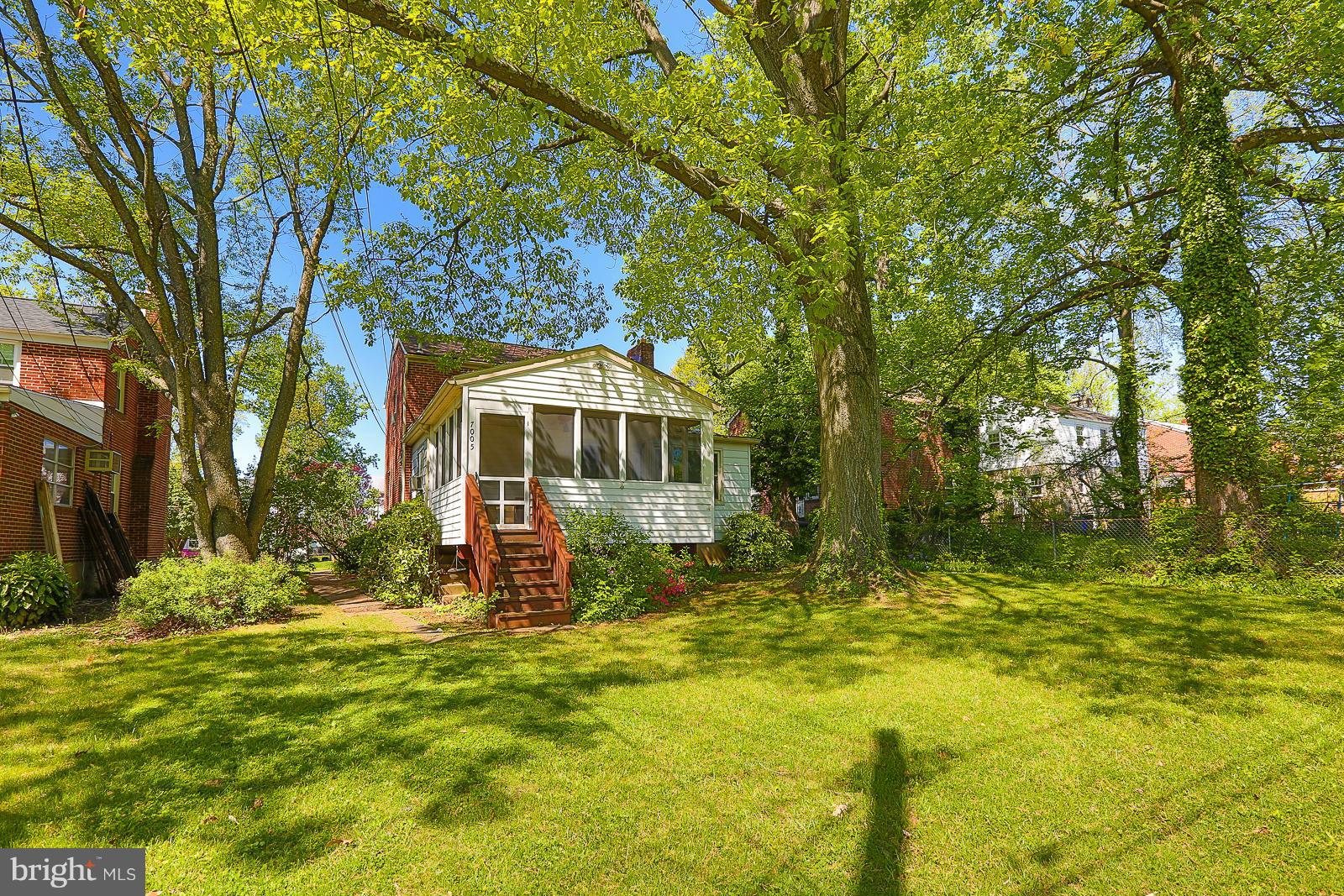 7005 Deerfield Road Pikesville, MD 21208 - Photo 27 of 30 Screened porch as seen from rear.