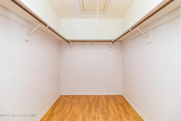 a view of a room with racks on the wall