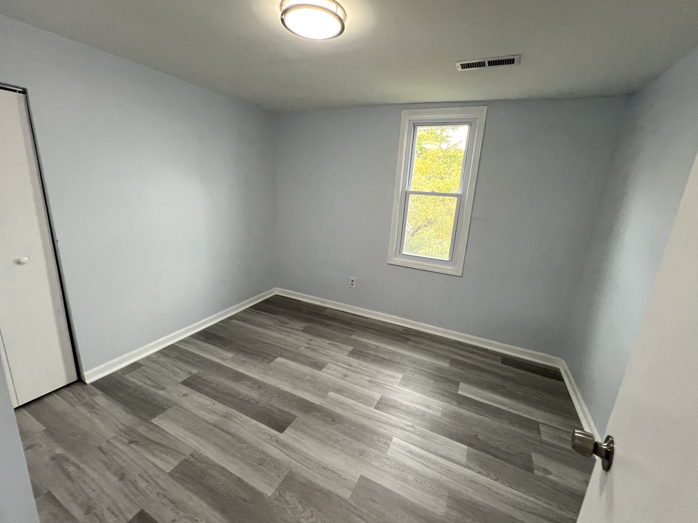 3002 Green Street, Unit 2 Steger, IL 60475 - Photo 20 of 31 an empty room with a window