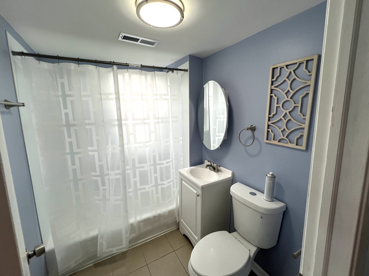 3002 Green Street, Unit 2 Steger, IL 60475 - Photo 22 of 31 a white toilet sitting next to a bathroom sink