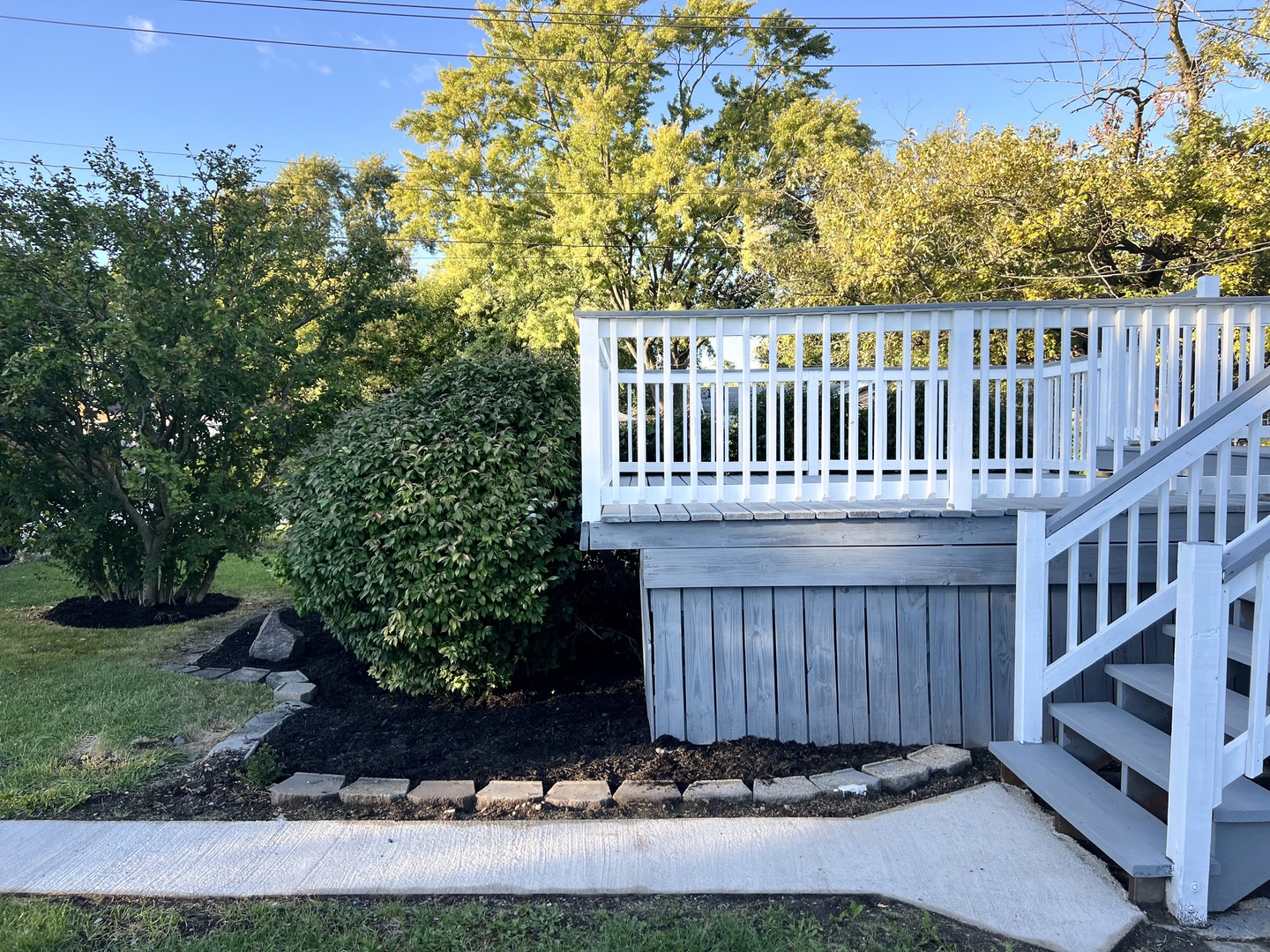 3002 Green Street, Unit 2 Steger, IL 60475 - Photo 4 of 31 a view of a deck with a fence