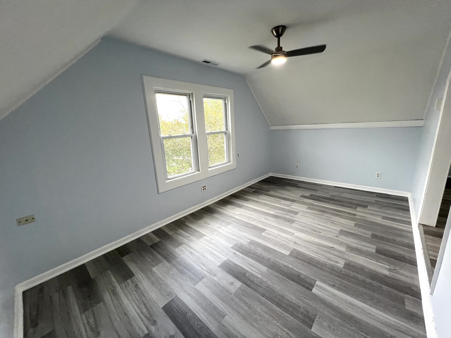 3002 Green Street, Unit 2 Steger, IL 60475 - Photo 8 of 31 wooden floor in an empty room with a window